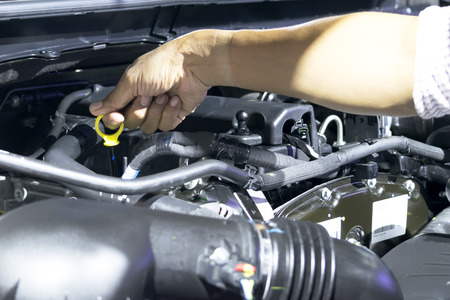 Engine check by Mechanical Handles, Check the oil To see the safety, Maintenance to use. The longer.の写真素材