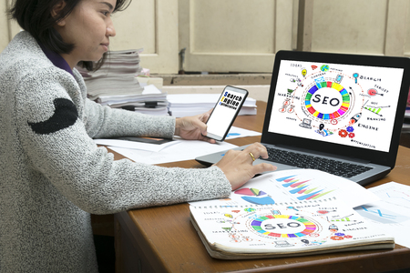 SEO Search Engine Optimization Internet Digital Concept,marketing e-commerce, online banking payment, and VOIP voice over internet protocol technology on mobile smart phone deviceの写真素材