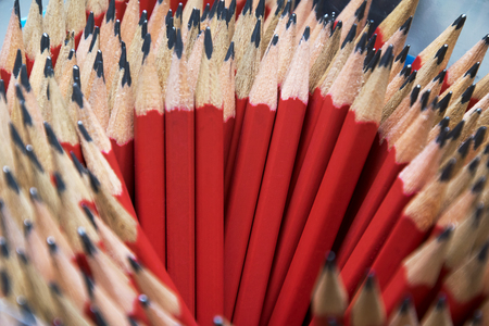 Tools used to create artistic works,Many red pencils Set in a circular arrangement,I have to be pointed,Depth of Field.の写真素材