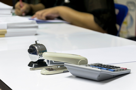 Office equipment is important to help make the job even more effective, pen, scissors, calculator, calculator, counting machine, A reminder paper, Cutting, The paper-clip.の写真素材