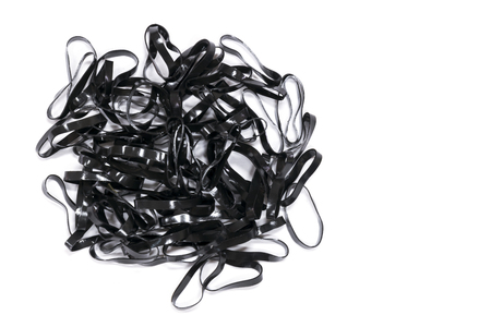 Black rubber band or plastic band isolated on white background, used for hair band. の写真素材