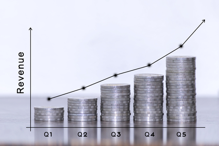 Investment concept,Coins graph stock market,thinking about the increasing revenue on chart with RGB glitch effect. Stock Photo,growing bar chart chalkboard.の写真素材