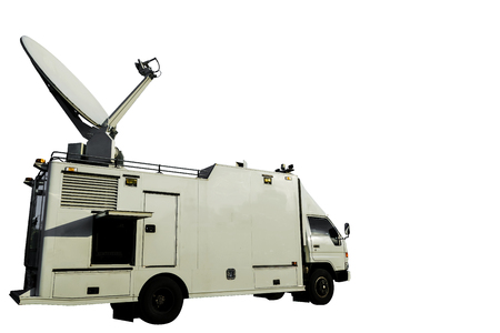 TV transmitter on a car for reporters.Antenna in a vehicle for television reporters.The outer-space communication aerial on a roof of the bus against,White background.の写真素材