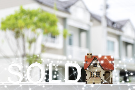 Buying - selling homes, The house model is placed , backdrop being home, Lines of light like a star Created from the program.の写真素材