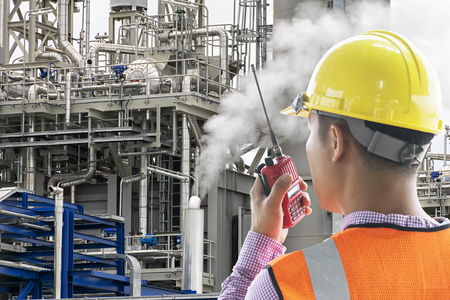 Leadership is very necessary for being a leader, Oil refinery work needs certainty, precision, Engineers are in control Construction, Use communication toolsの写真素材