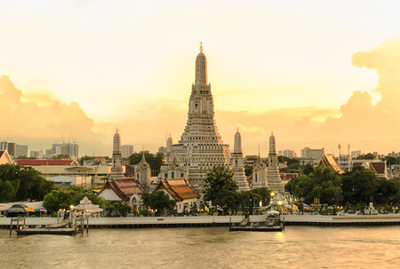 The famous Wat Arun , is one of the best known landmarks, The front is the Chao Phraya River. Sunset time, Twilight.のeditorial素材