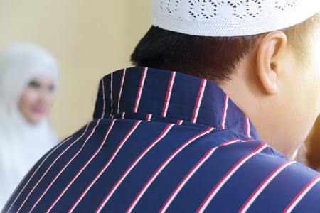 Islamic culture, marriage is an important and sacred ceremony. The scene is a Muslim man and a...
