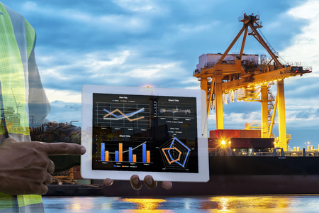 Shipping industry. Transportation ship shipping is a popular method.Business growth has continued to grow.The ship is waiting Going out.To make the country's economic growth.Graphics chart.のeditorial素材