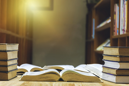 Library is a very important source of knowledge. The table has many books to read to increase the...