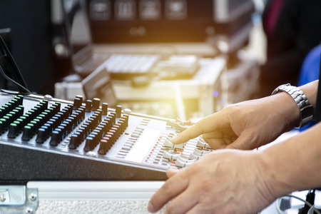 Audio Controller,Work experts use,Musical amplifier on a background of speakers,Signal cable connected to Audio mixer,Sound system,Sound cable on studio in plug, wires plugged into sound amplifiers.の写真素材