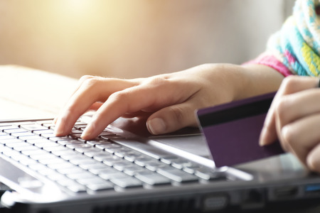 Online shopping concept . Women are buying online with a credit card. Online Shopping Website on Laptop.の写真素材