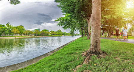 The park Panorama concept. Is a source of oxygen to the community. People are jogging a lot. The large pond is pleasant to the eye and mind.のeditorial素材