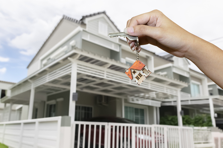 The home trading business has been giving away home keys to people who get it. The background is home to live.のeditorial素材