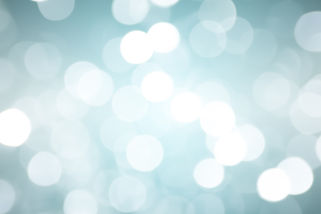 Blue abstract bokeh background. Floating in the air.の写真素材