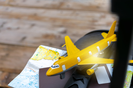 Traveling concept. Luggage with maps, passports, airplane models. Get ready to meet new things. Stimulate the economy to grow all sectors.の写真素材