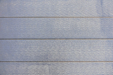 Brown wood background. Wooden sticks Connected to create a wall, to be private, to prevent danger.の写真素材