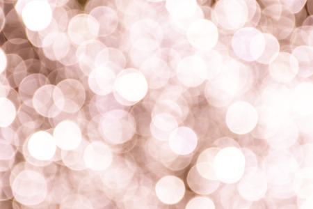 Red abstract bokeh background. Floating in the air. light on light blue background. Like the stars in the universe.の写真素材
