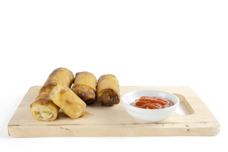 Spring rolls are from Chinese that we have eaten in the Dim Sum menu., ketchup. The original filling is minced pork vermicelli.  on white background.の写真素材