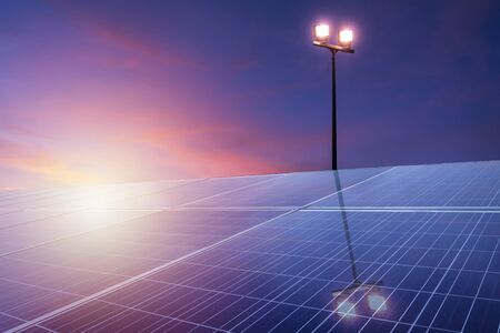 Clean Energy concept. Renewable energy is a necessity of the future world, Solar Cell Future Energy, Solar panels solar on the background of the area ââthe sky and electric pole.の写真素材