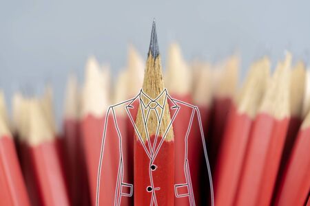 Leadership successful team leader (manager, CEO, market leader) and another business leading concepts. Standing out from the crowd. Red pencil and dress with suit from graphic.の写真素材