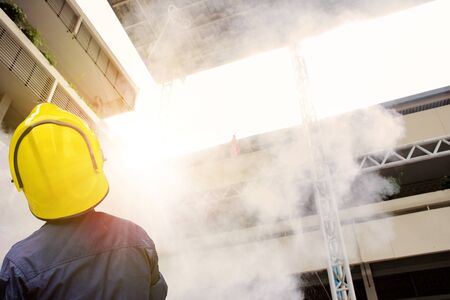 Firefighters training, Team practice to fighting with fire in emergency situation. The chief is...