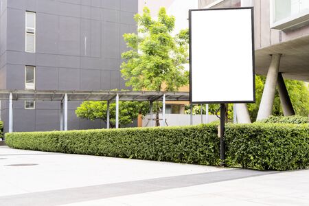 Billboards concept. Installed in the corridor with buildings and trees as an element, The floor is empty, can be put on advertising media.の写真素材