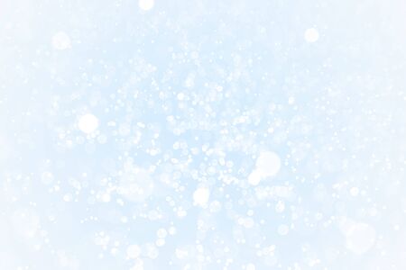 A brilliant blurry white background for a festive mood. Template for greeting card for entertainment. abstract white bokeh background.の写真素材