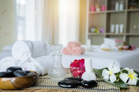 Beautiful spa composition concept. spa massage setting, lavender product, oil on wooden background.の写真素材