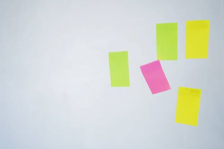 sticky note attached to various colored glass. To enter text, create advertising mediaの写真素材