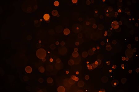 Defocused abstract red lights background. Red glitter vintage lights, christmas, sequin light.の写真素材