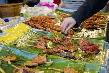 Streetfood in south east asia concept. Fried food with sticks, Thai style food, Thailand street food ,Bangkok.の写真素材