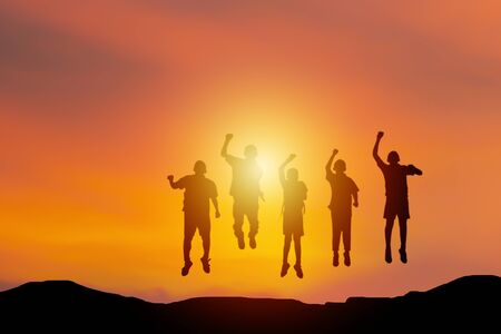 The success of the team isolate concept. Standing atop his show jumping with joy at the success it has been. The setting sun was a beautiful atmosphere.の写真素材