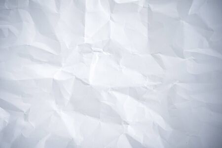 Background concept. The white paper that looks like a crumpled into a pattern.の写真素材