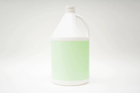 White plastic packaging placed on a white background. Green label floor for text, images, advertising media.の写真素材