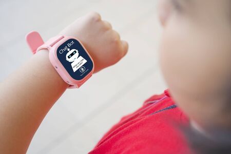 artificial intelligence,AI chat bot concept. The girl is using the phone watch. chatbot answering questions online, robot assistant help on websiteの写真素材