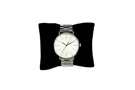 business man watch, luxury watch isolated on a white background. Wearing a small black pillow.の写真素材