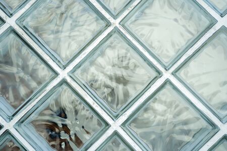 Pattern of glass block wall. It can be used as background for graphic work. old glass brick wallの写真素材