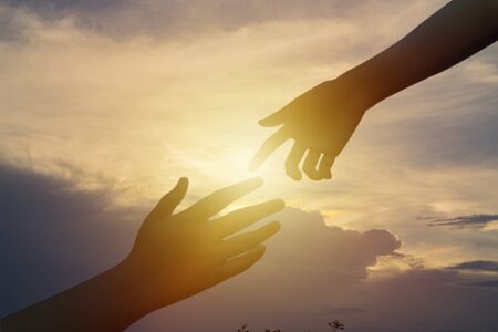 Teamwork help is important isolate concept. a new challenge. I am reaching out to look at that draws more people to the summit as well. He has assisted as well.の写真素材