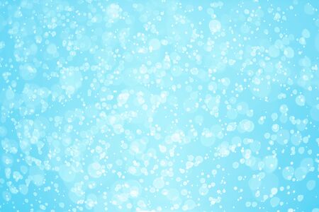 Blue bokeh background. Winter elegant bokeh background. Seasonal cooling light decorative abstract design element.の写真素材