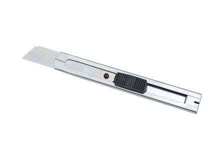 Cutter knife made of stainless steel, isolated white backgroundの写真素材