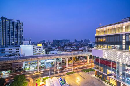 Bangkok cityscape concept. Bangkok night view in the business district at twilight, View of Bangkok buildings, Thailand. And skytrainの写真素材