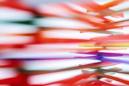 Abstract background from many multi-color tubules for a cocktail. colored plastic tubes in a soft light. abstract composition.の写真素材