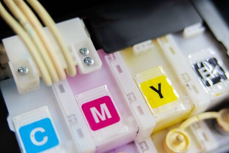 Ink jet printer ink tank for refill, CMYK ink tank installed on the side of inkjet printerの写真素材