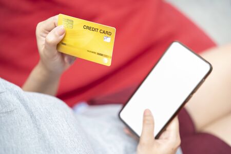 Online Shopping smartphone, Easy E-commerce concept. Close up Hands Using Smartphone white screen, Digital Payment gatewayの写真素材