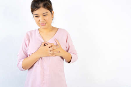 Asian woman is ill due to colds, allergies, allergies, bad weather, dust, tuberculosis, air pollution, lung cancer, emphysema concept Double exposure with the lungs, Virus infectionの写真素材