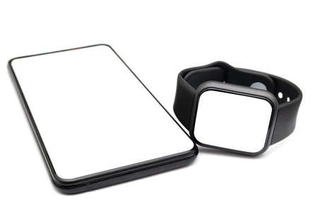 Modern internet smart watch and smartphone on white isolated backgroundの写真素材
