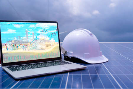 Working solar station photovoltaic panels, Science, engineer working on checking and maintenance equipment at industry solar power, Investment in the stock marketの写真素材