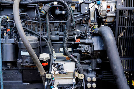 The powerful engine of a car. Internal design of engine. Car engine part. Modern powerful car...
