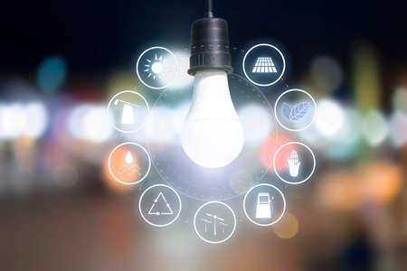 Light Bulb, world environment day concept. Abstract blur colorful bokeh city lights over, During the night the bright lights.の写真素材