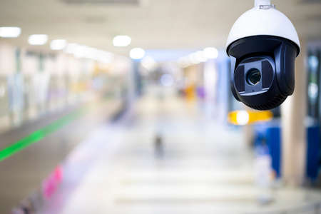 Closed-circuit television,Security CCTV camera or surveillance system in background of Checkpoint - Body and bag Luggage Scan Machine ,Secure Airport Check Inの写真素材